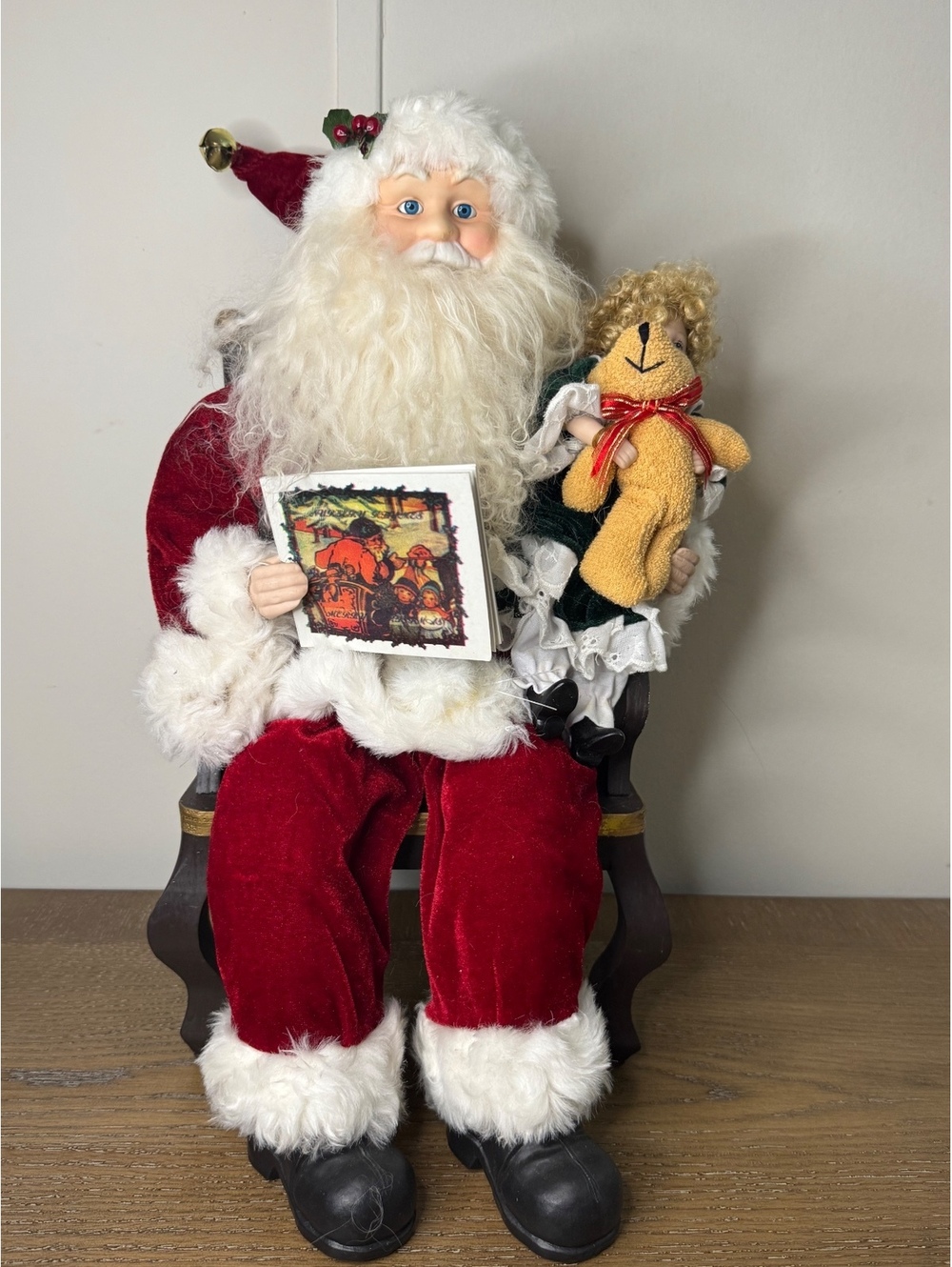 Santa Claus seated in chair figurine